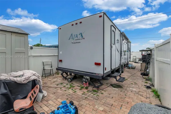 a view of a chairs in a patio