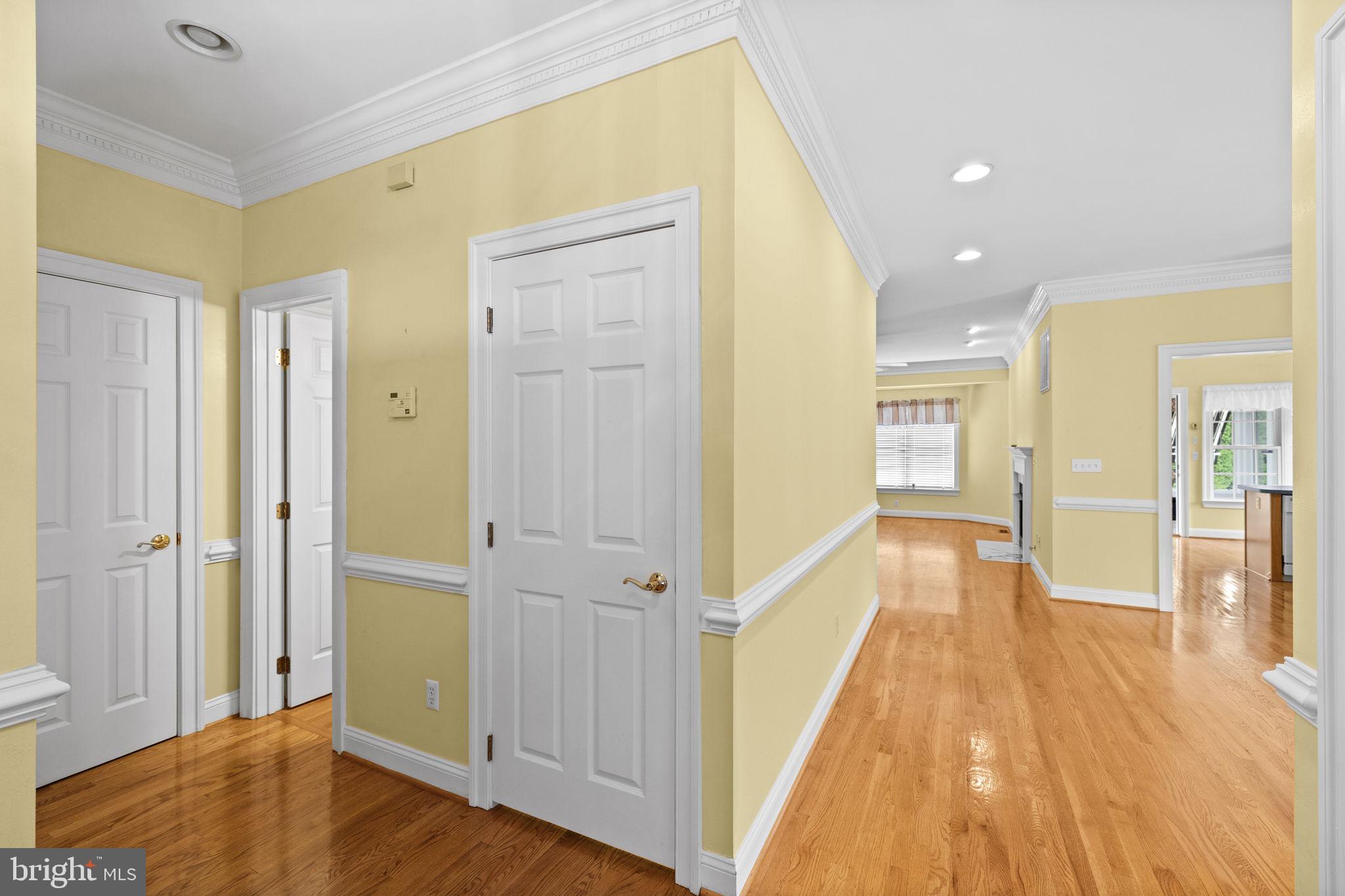621 Country Club Road Culpeper, VA 22701 - Photo 12 of 45 Inviting hallway with warm tones.