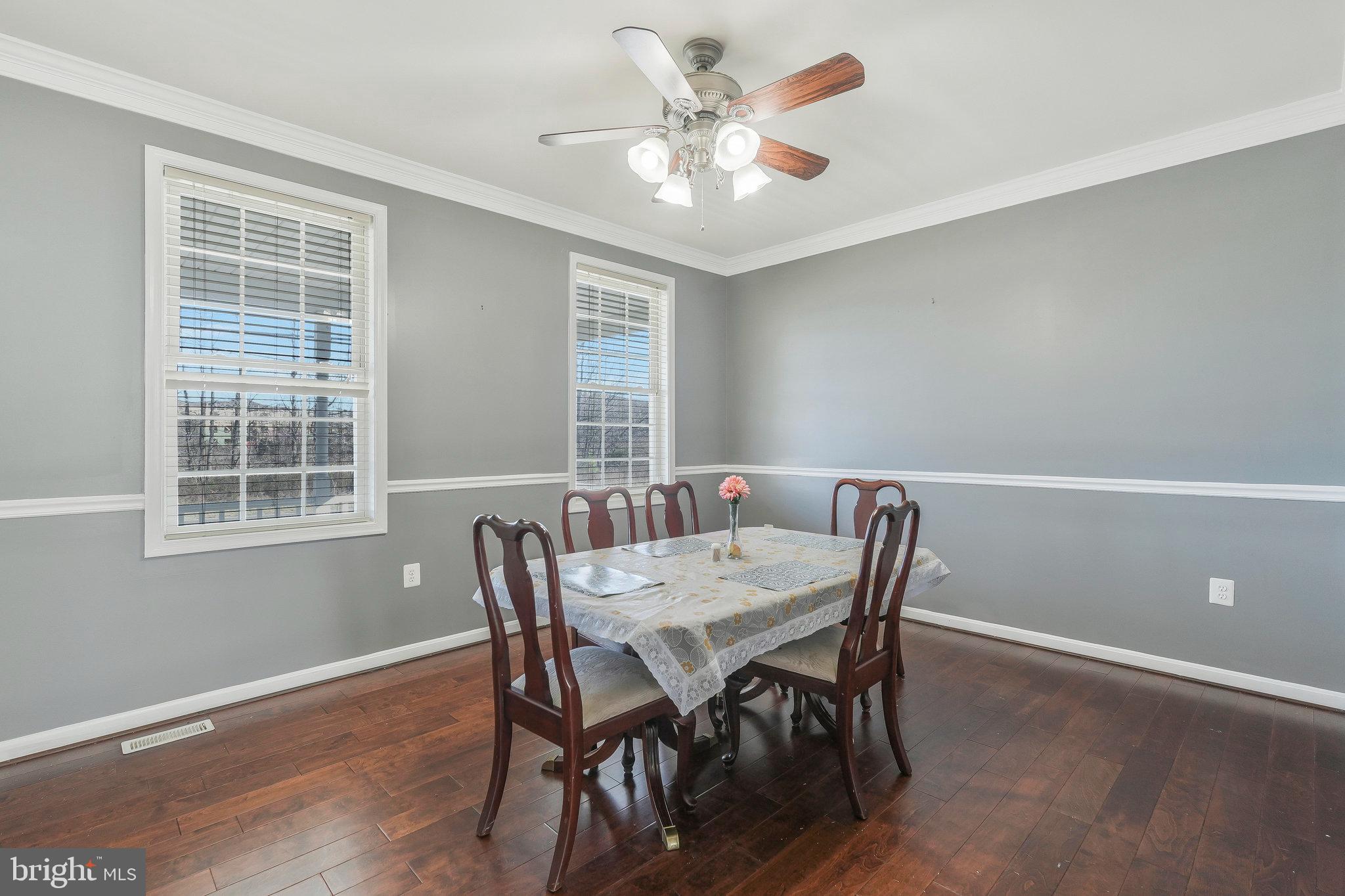12433 Sub-Station Road Waldorf, MD 20601 - Photo 9 of 52 Crown Molding & Chair Rail highlight the Dining Rm