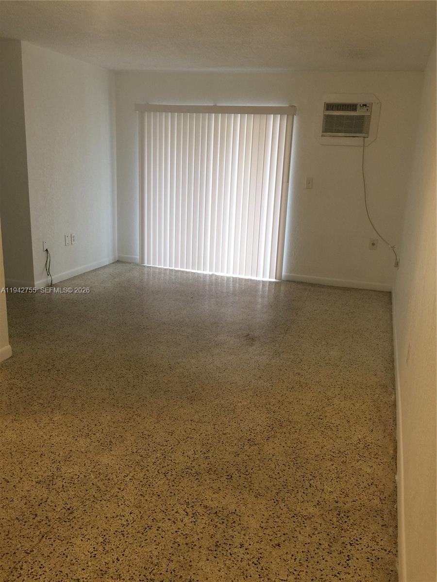 142 Southwest 18th Avenue, Unit 19 Miami, FL 33135 - Photo 11 of 11 an empty room with windows