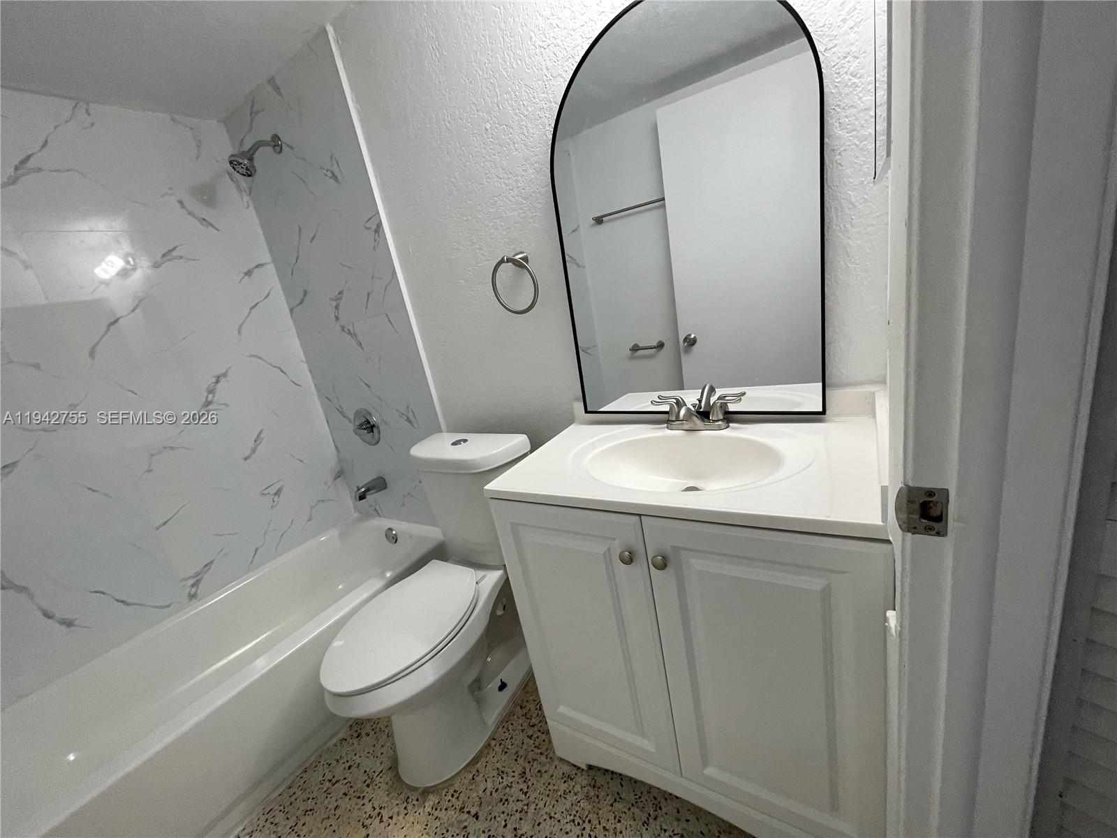 142 Southwest 18th Avenue, Unit 19 Miami, FL 33135 - Photo 13 of 28 a bathroom with a sink toilet and shower