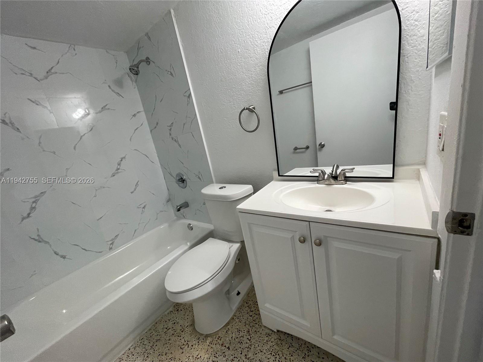142 Southwest 18th Avenue, Unit 19 Miami, FL 33135 - Photo 14 of 28 a bathroom with a sink toilet and shower