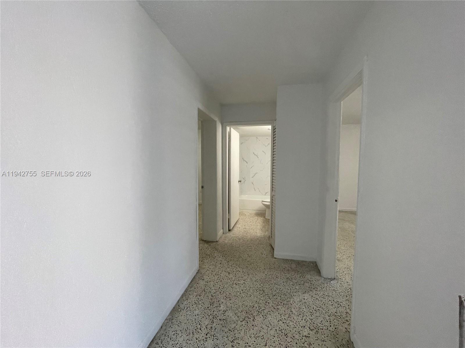 142 Southwest 18th Avenue, Unit 19 Miami, FL 33135 - Photo 23 of 28 a view of hallway with rug