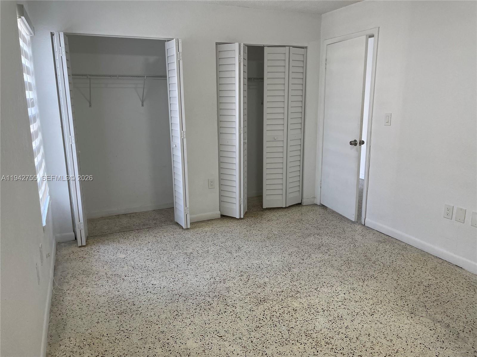 142 Southwest 18th Avenue, Unit 19 Miami, FL 33135 - Photo 7 of 28 an empty room with closet