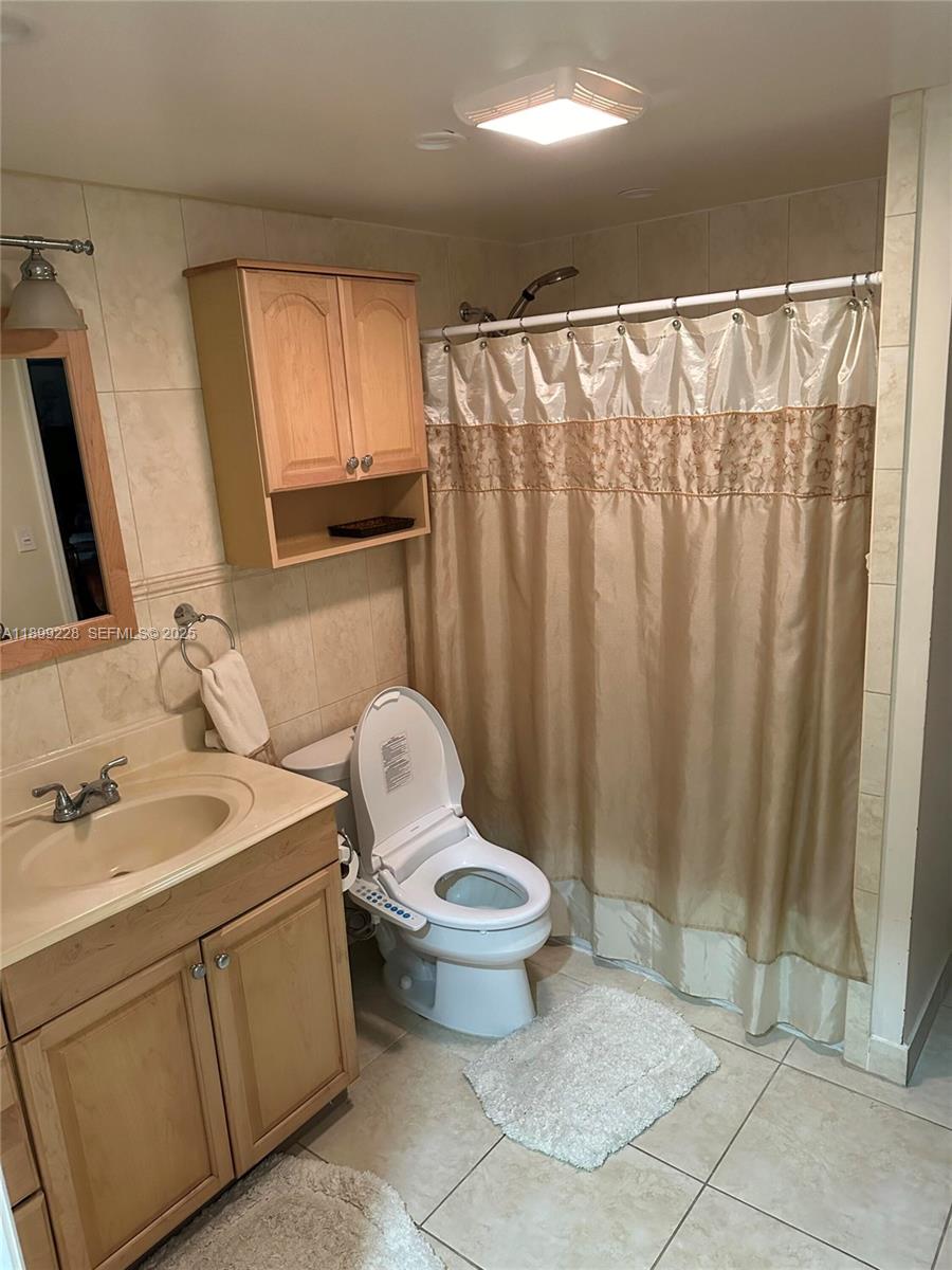 6300 Southwest 181st Lane Southwest Ranches, FL 33331 - Photo 15 of 20 a bathroom with a sink toilet and shower