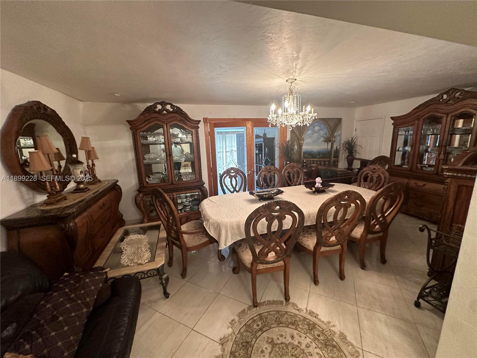 6300 Southwest 181st Lane Southwest Ranches, FL 33331 - Photo 20 of 20 a view of a dining room with furniture