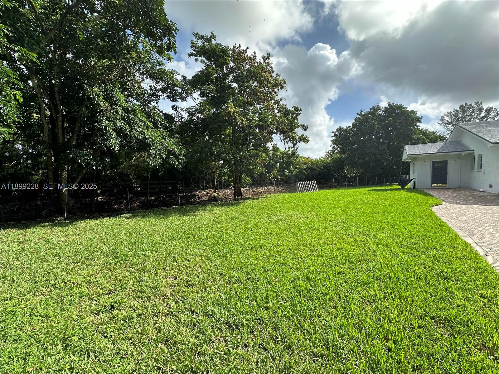 6300 Southwest 181st Lane Southwest Ranches, FL 33331 - Photo 6 of 20 a view of a garden with a slide