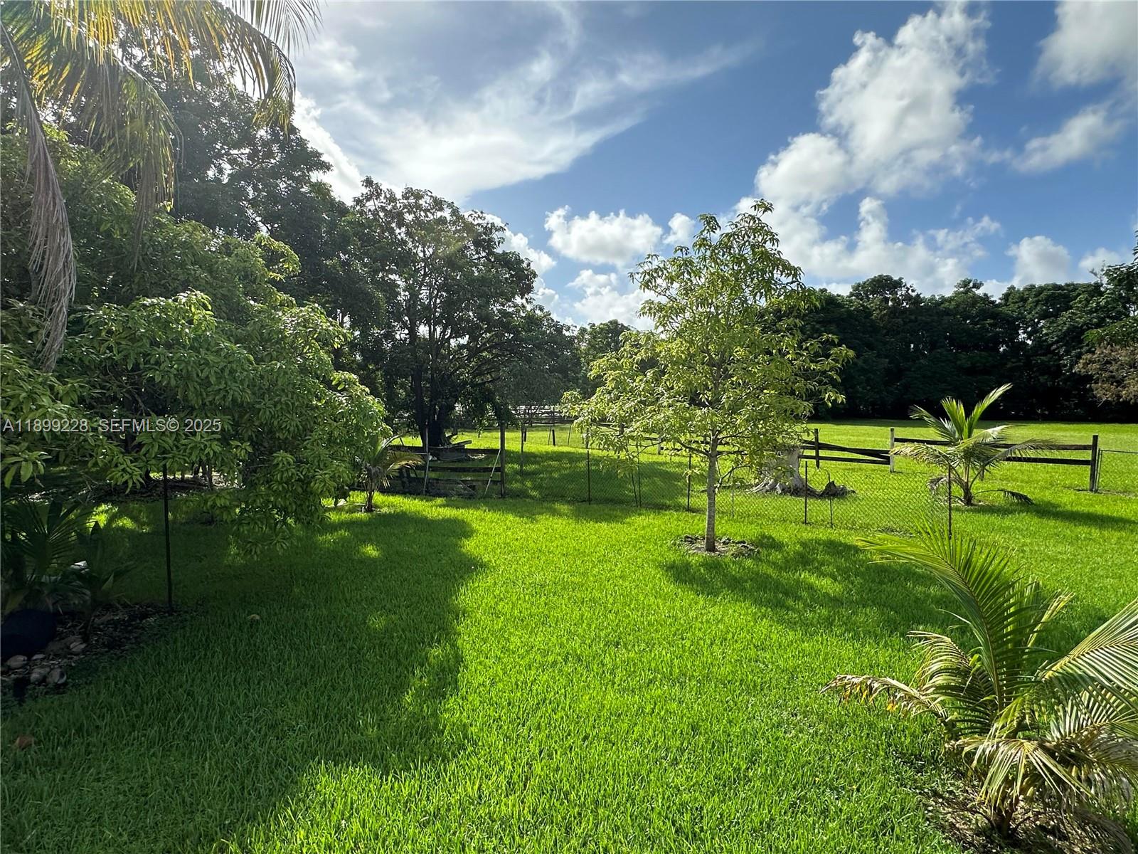 6300 Southwest 181st Lane Southwest Ranches, FL 33331 - Photo 10 of 20 a view of a golf course with a lake
