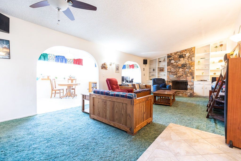 737 Scott Circle Ridgecrest, CA 93555 - Photo 7 of 49 a living room with furniture and a flat screen tv