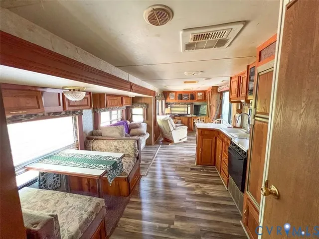 a living room with furniture and a table