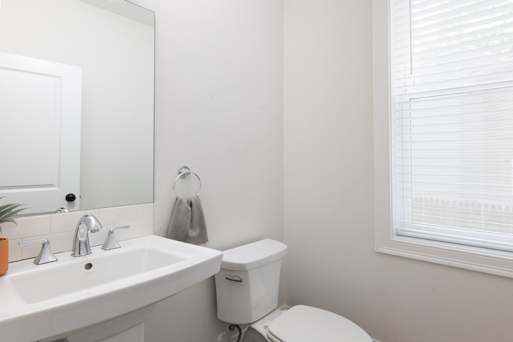 9 Hazel Terrace Arlington, MA 02474 - Photo 14 of 36 a bathroom with a sink mirror and toilet