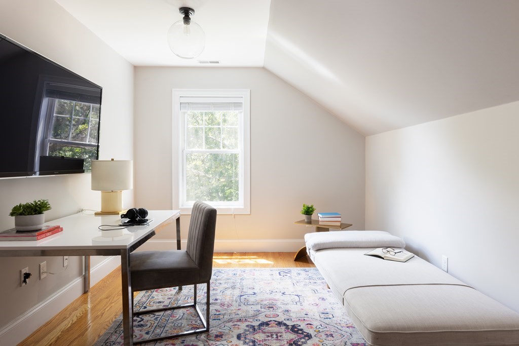 9 Hazel Terrace Arlington, MA 02474 - Photo 20 of 36 a living room with furniture and a window