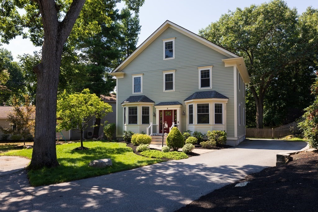 9 Hazel Terrace Arlington, MA 02474 - Photo 2 of 36 a front view of a house with garden
