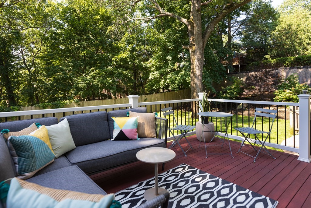 9 Hazel Terrace Arlington, MA 02474 - Photo 25 of 36 a balcony with furniture and wooden floor