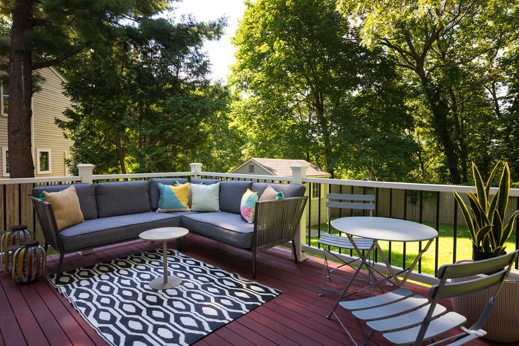 9 Hazel Terrace Arlington, MA 02474 - Photo 26 of 36 a balcony with furniture and a potted plant