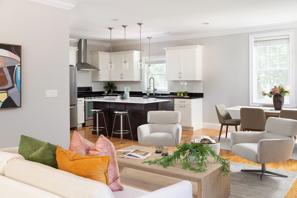 9 Hazel Terrace Arlington, MA 02474 - Photo 3 of 36 a living room with furniture and a large window