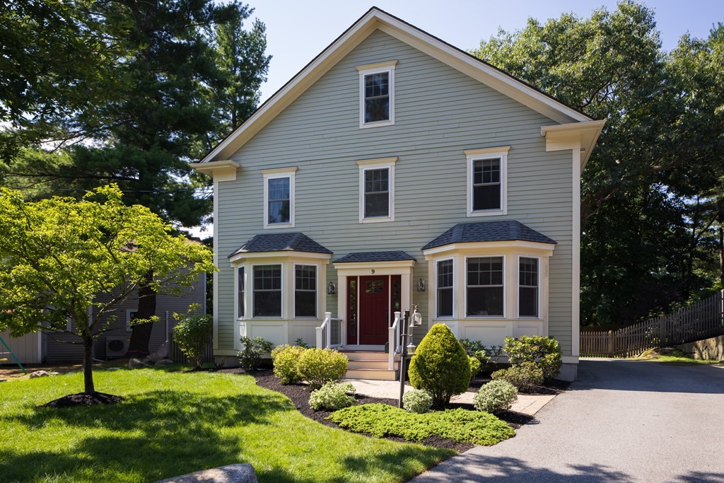 9 Hazel Terrace Arlington, MA 02474 - Photo 33 of 36 a front view of a house with a yard