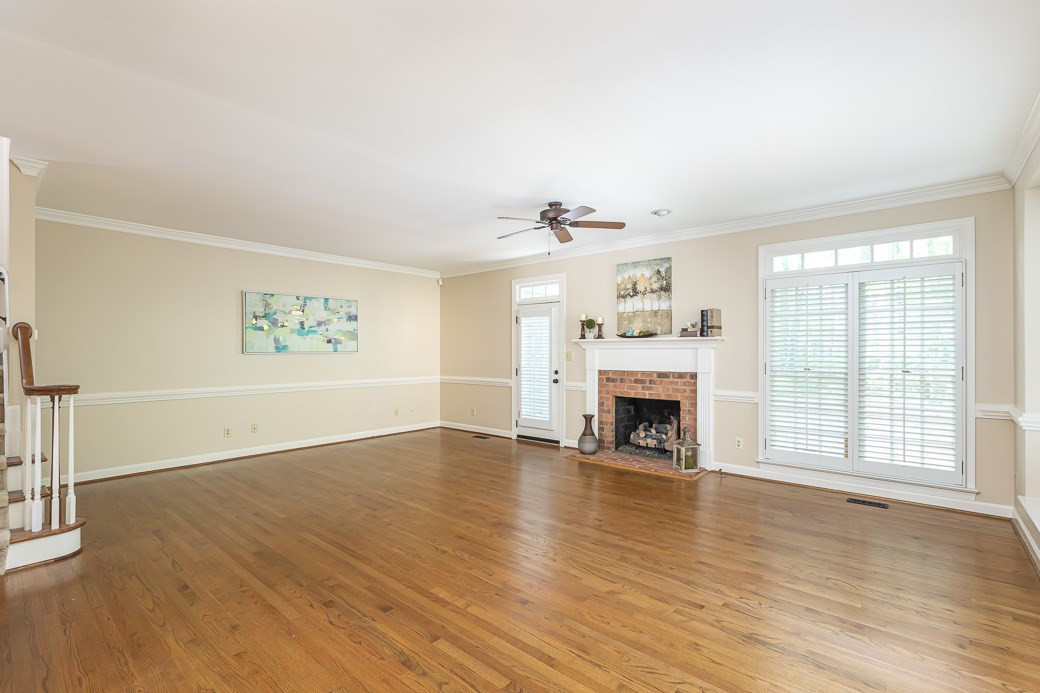 6120 Friars Walk Place Raleigh, NC 27609 - Photo 6 of 21 Open family room has HARDWOOD floors, chair railing and lots of NATURAL LIGHT. FAMILY ROOM