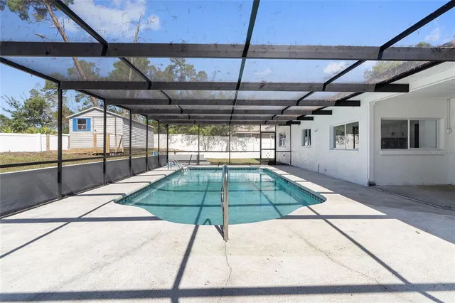 a view of a backyard of a house