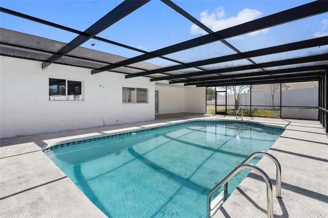 a view of backyard and tree
