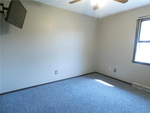 an empty room with a window