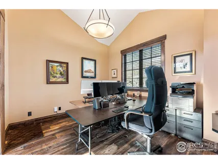 a bathroom with a toilet a sink and a mirror