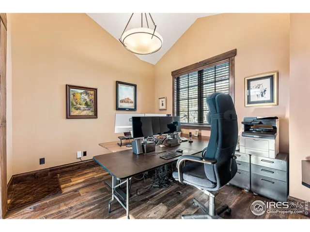 a bathroom with a toilet a sink and a mirror