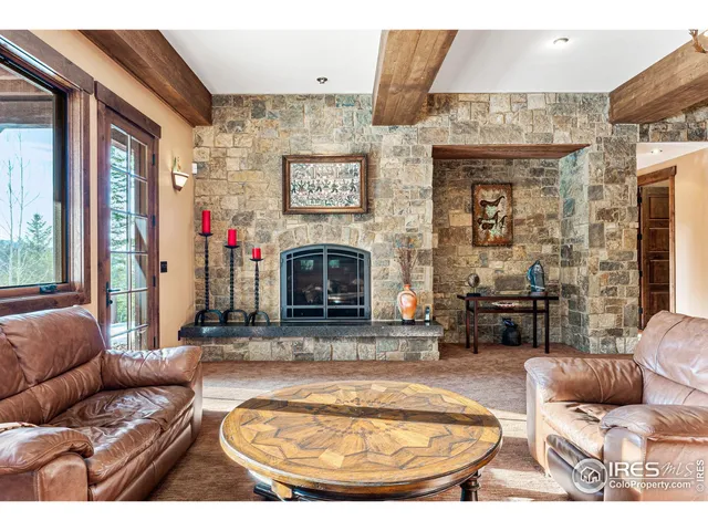 a bedroom with a bed and a desk