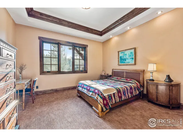 a bathroom with a sink toilet a mirror and shower