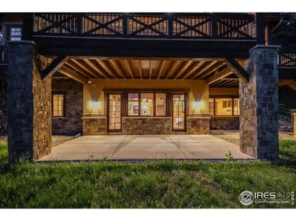 a view of a house with a small yard