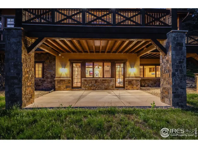a view of a house with a small yard