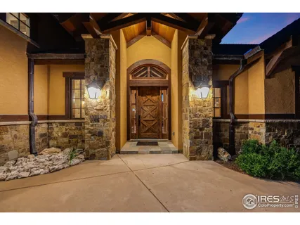 a view of entrance gate of the house