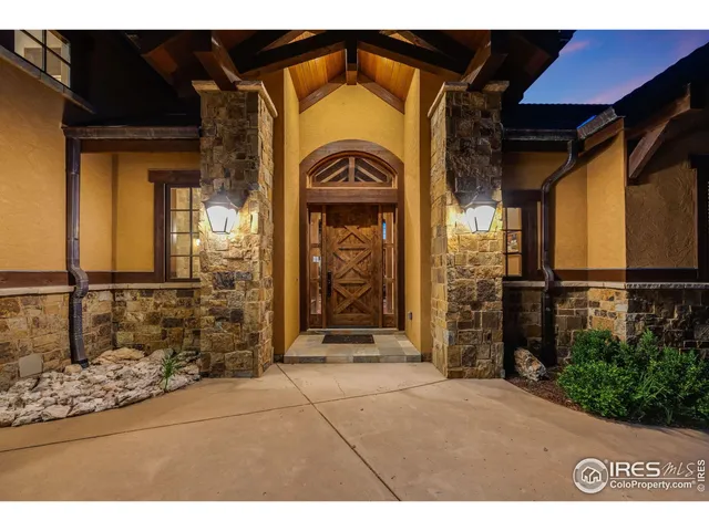 a view of entrance gate of the house