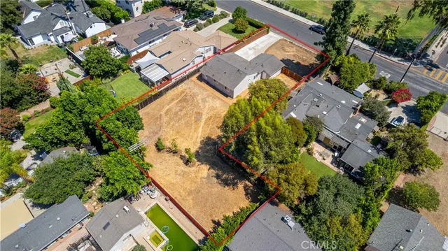 an aerial view of residential house with outdoor space