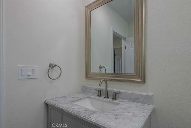 a bathroom with a shower and toilet