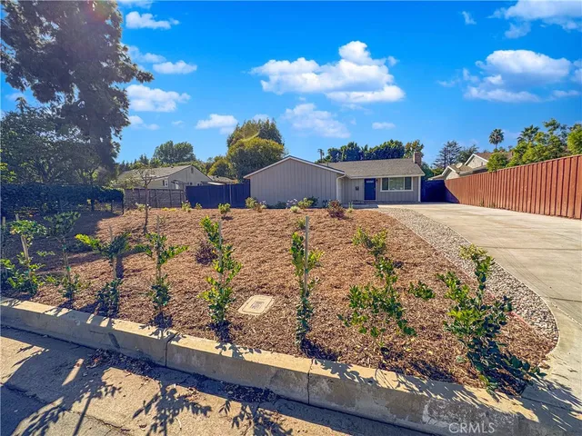 a view of a terrace with a garden and covered with snow