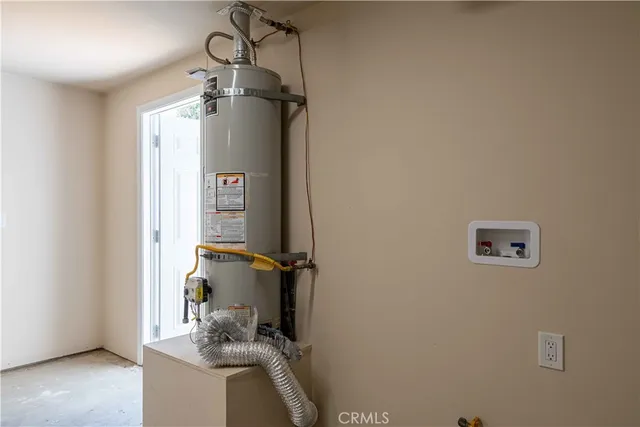 a view of an empty room with a fireplace