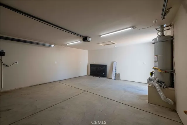 a view of backyard space and trees