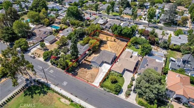 an aerial view of residential house with outdoor space