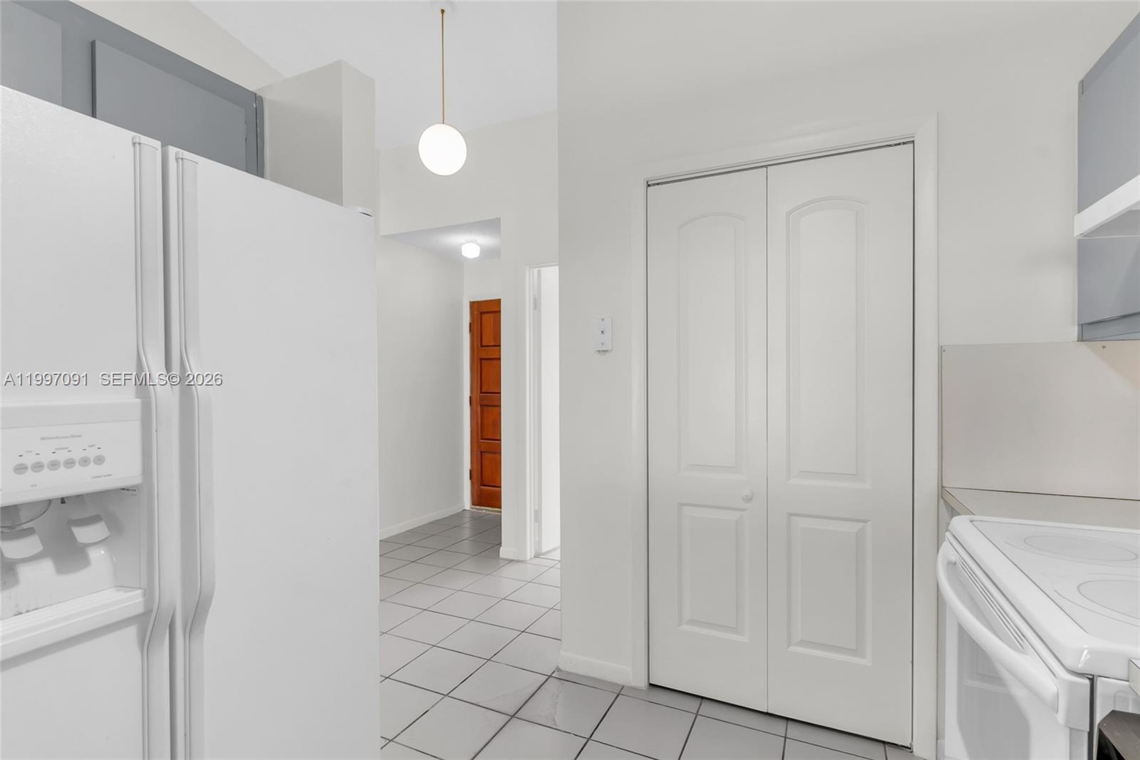 6323 Southwest 147th Pl Circle Miami, FL 33193 - Photo 12 of 29 a view of a livingroom with an empty space and a sink