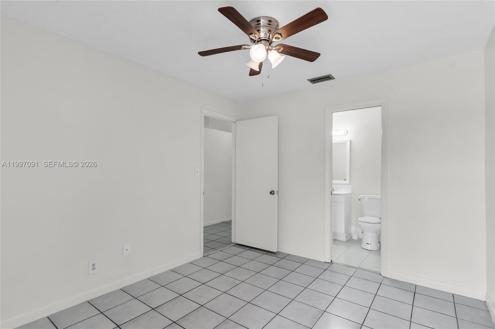 6323 Southwest 147th Pl Circle Miami, FL 33193 - Photo 14 of 29 a view of an empty room