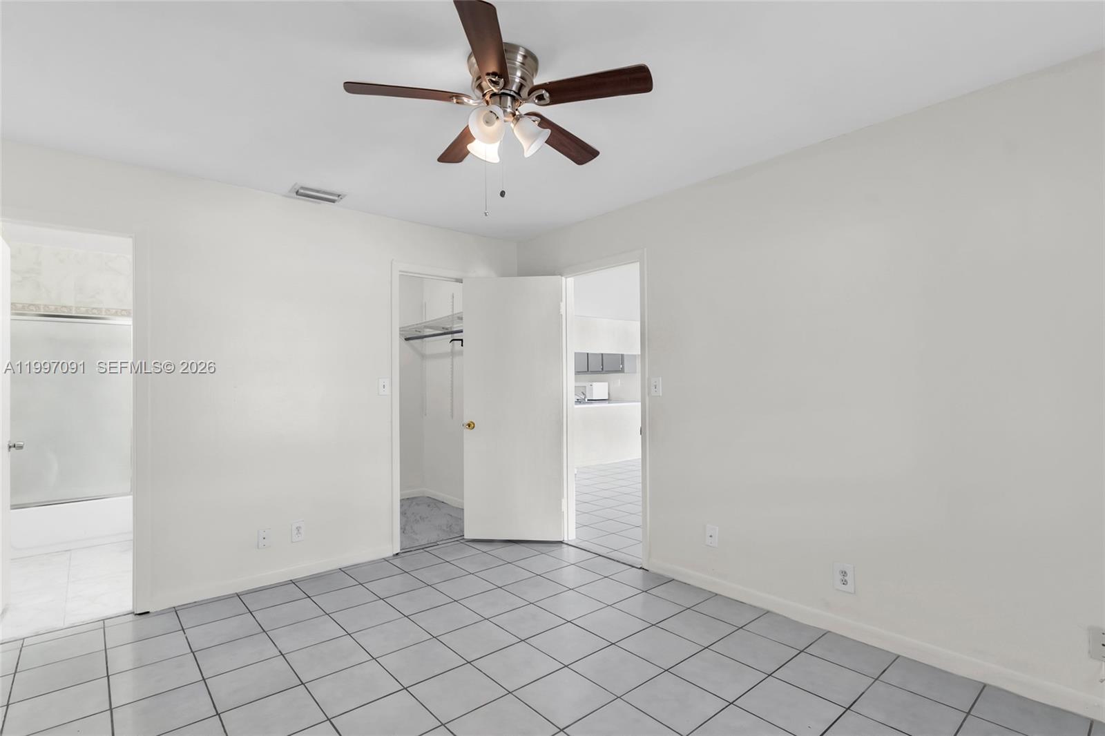 6323 Southwest 147th Pl Circle Miami, FL 33193 - Photo 19 of 29 wooden floor in an empty room