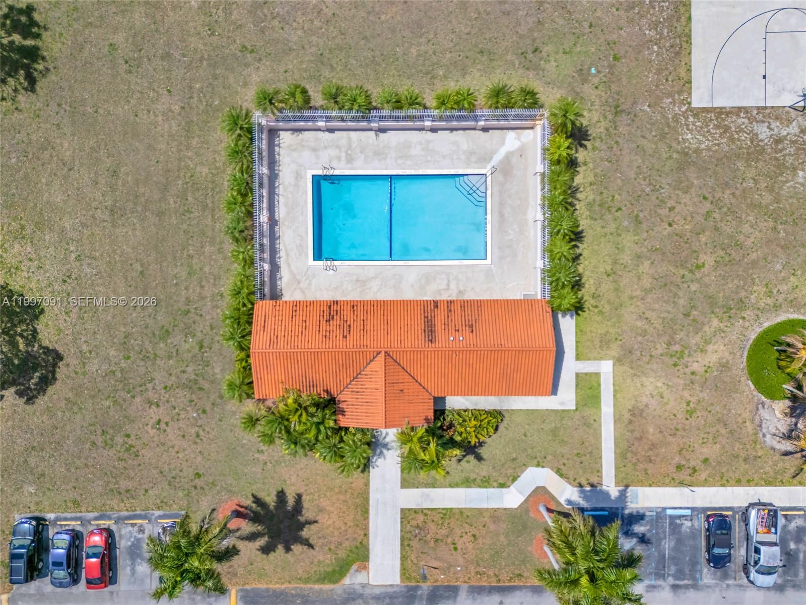 6323 Southwest 147th Pl Circle Miami, FL 33193 - Photo 28 of 29 a picture of a wall with a fireplace and a potted plant