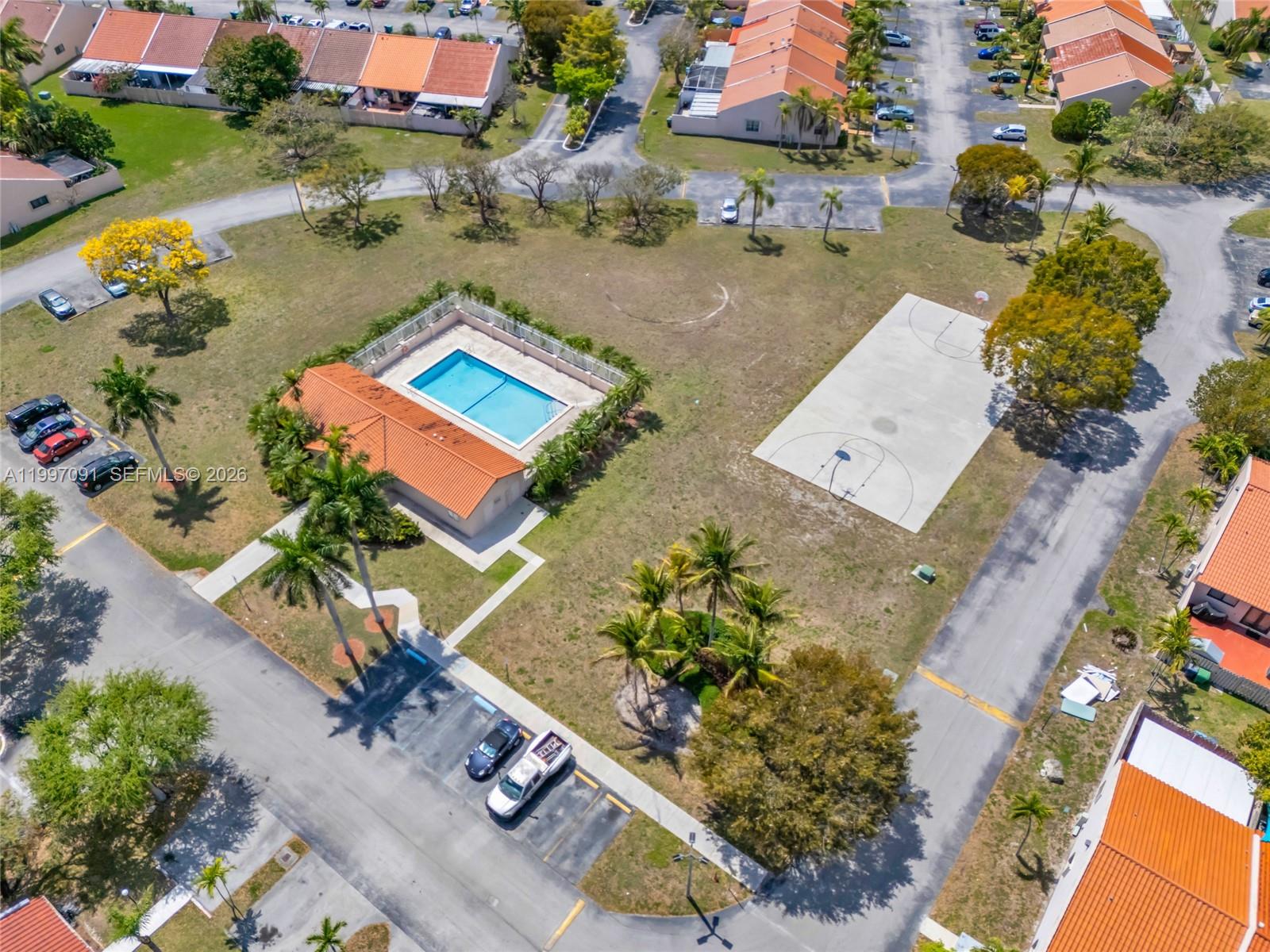 6323 Southwest 147th Pl Circle Miami, FL 33193 - Photo 29 of 29 an aerial view of a house with a lake view
