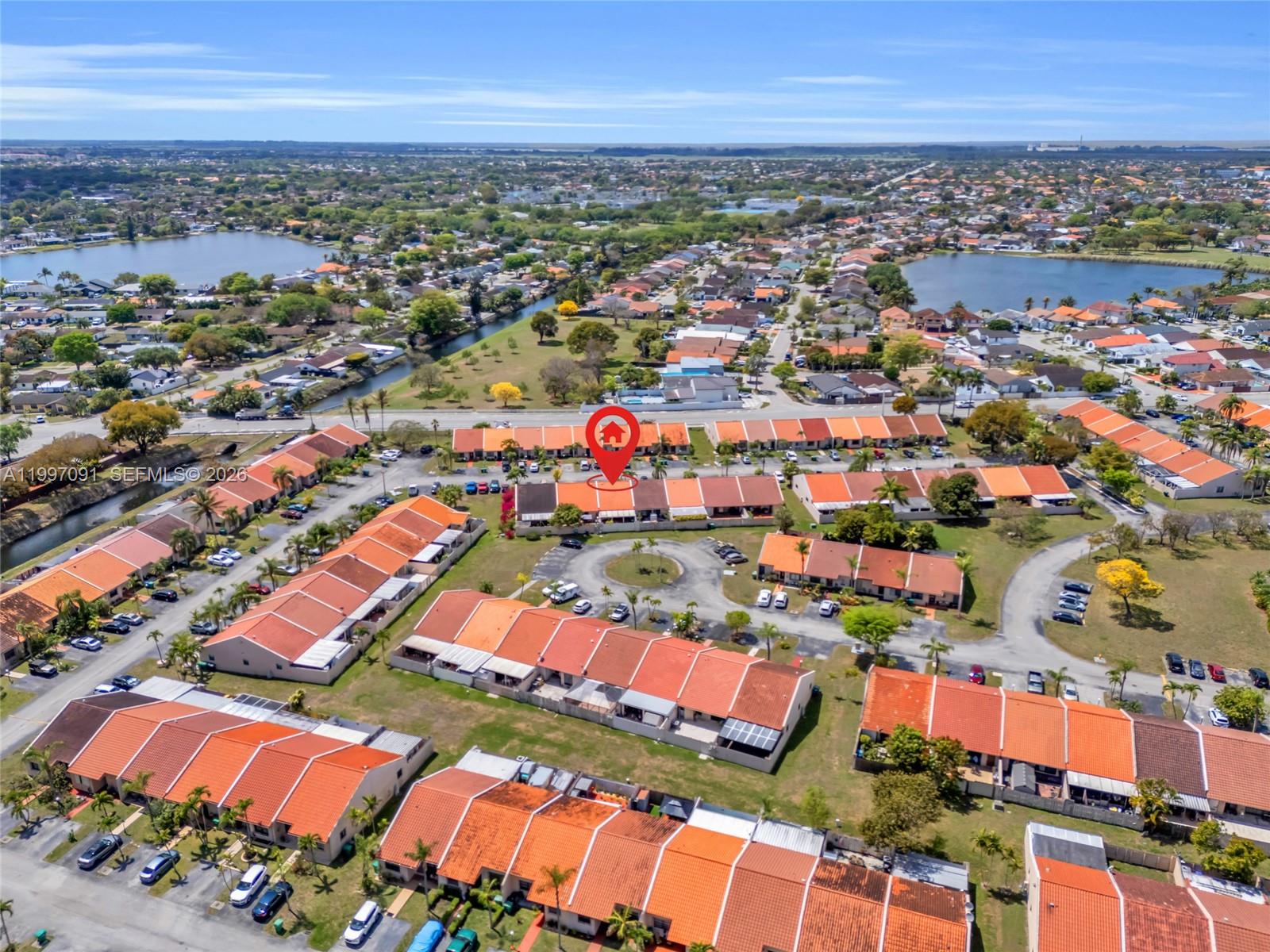 6323 Southwest 147th Pl Circle Miami, FL 33193 - Photo 3 of 29 an aerial view of residential houses with outdoor space