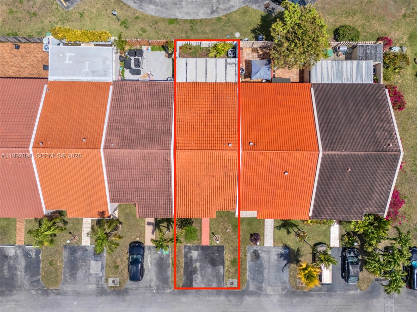 6323 Southwest 147th Pl Circle Miami, FL 33193 - Photo 4 of 29 an aerial view of a house with a yard and seating space