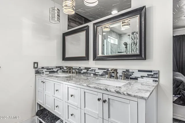 an aerial view of mountain and residential houses with outdoor space
