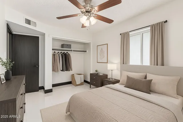 an aerial view of a house with a swimming pool