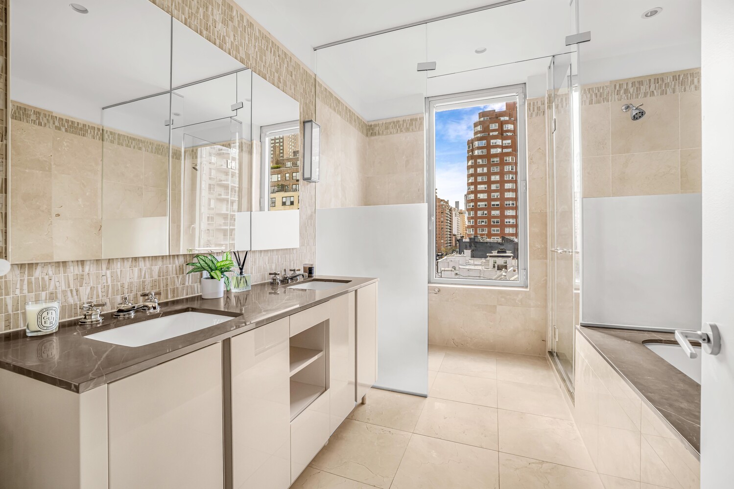 255 East 74th Street, Unit 6C Manhattan, NY 10021 - Photo 8 of 9 a kitchen with a sink and a stove top oven