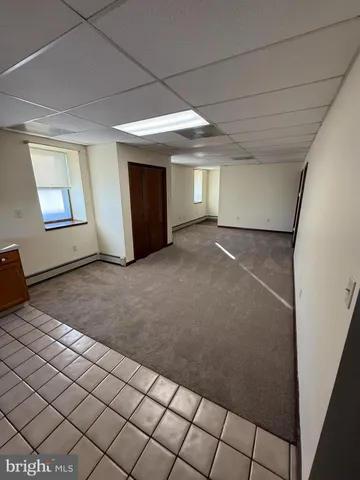 a kitchen with stainless steel appliances a refrigerator and a stove